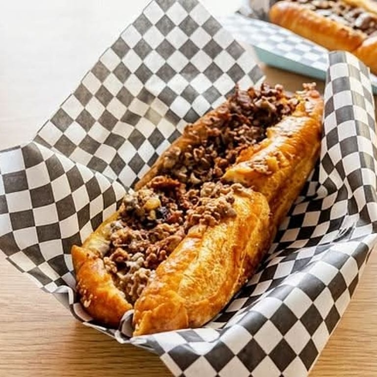 Indulge in Our Cheesesteak
